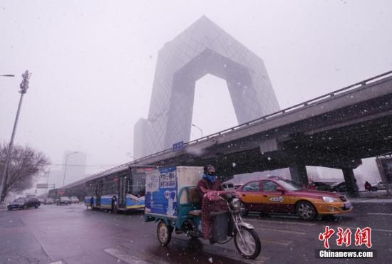 资料图：2月12日，北京城区出现明显降雪过程。<a target='_blank' href='http://www.chinanews.com/'>中新社</a>记者 贾天勇 摄
