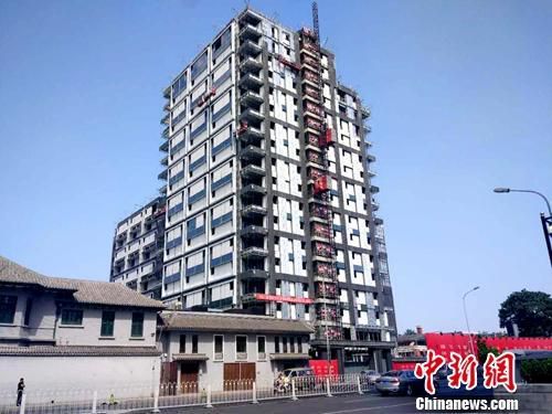 资料图：正在建设的楼房。中新网记者 李金磊 摄