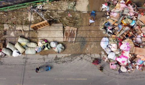 洪水|图记｜固镇镇遭遇洪水的6天6夜后居民返回清理家园