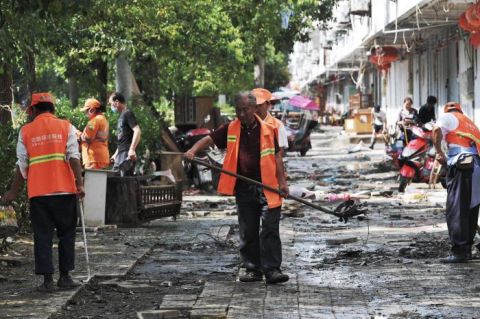 洪水|图记｜固镇镇遭遇洪水的6天6夜后居民返回清理家园